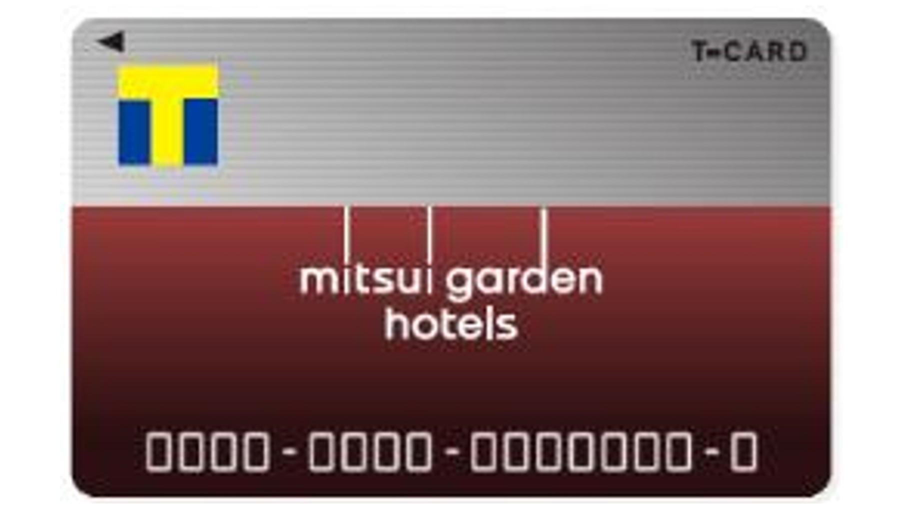 This is an explanatory image of the signing of the point program agreement between Mitsui Garden Hotels and T Point Japan. 